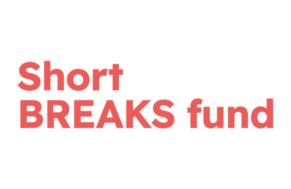 Text reads Short BREAKS fund in bold, coral-colored letters on a white background.