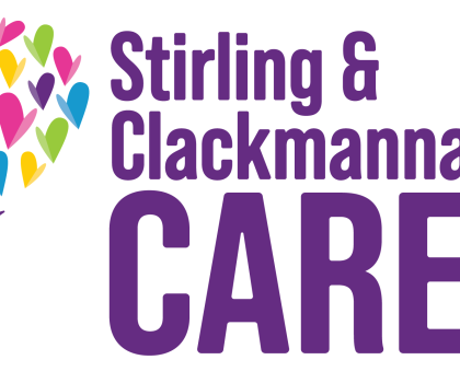 The Stirling & Clackmannanshire Carers logo features a person icon beneath a large heart made of smaller colourful hearts.